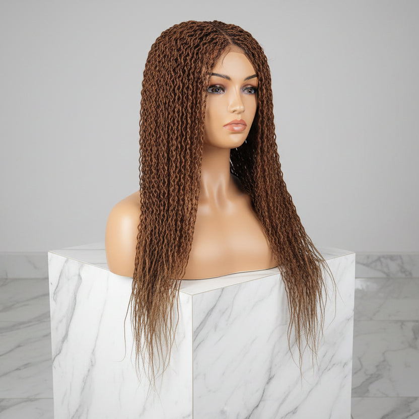 Curly wig with warm medium brown base with darker brown to near-black highlights throughout the curls.