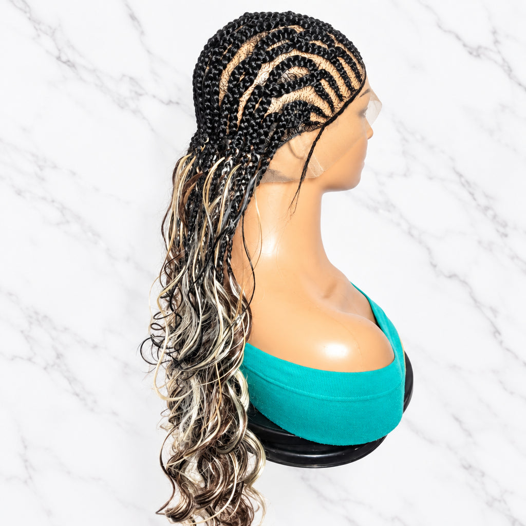 A long, wavy braided wig. The wig features dark brown to black braids with highlighted silver and blonde streaks throughout the lower section.